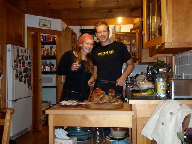 Carving up the Christmas turkey with my sister, Kendra