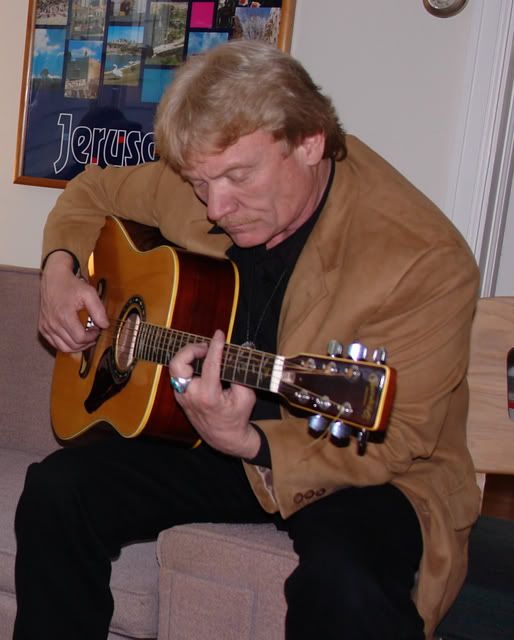 Rev. Hubbard on guitar