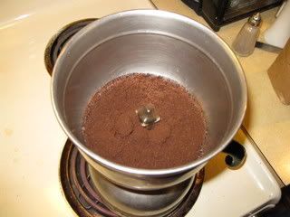 Assembled Assmebled, water starting to move into upper chamber. Stir a little as the water rises to get all the coffee wetted.